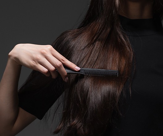 girl combing long hair